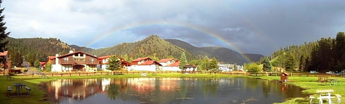 caribel condominiums under a rainbow